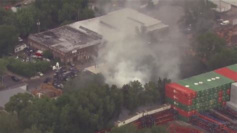 Fire crews respond to 2-alarm blaze at rail container yard in Back of the Yards